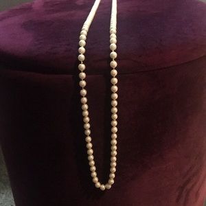 Long pearl necklace